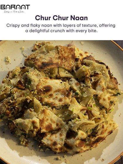 A closer look at the flaky, crushed texture of my Chur Chur Naan, a specialty bread that's full of character.