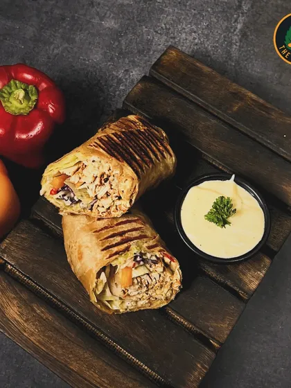 My Mediterranean Wrap is a journey of flavors. It's filled with hummus, toum, fresh veggies, and your choice of protein for a delightful and healthy meal.
