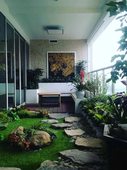 Even a long, narrow balcony can become a lush, private jungle. For this project, I used a mix of natural stones, a soft lawn, and layered plants to create a path that feels like a walk through nature, right at home.