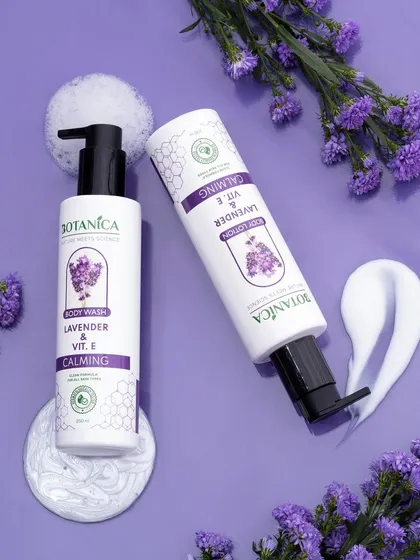 A calming composition for a lavender-scented body wash and lotion. The purple color scheme, lavender sprigs, and gentle swirls of product create a serene and relaxing mood.