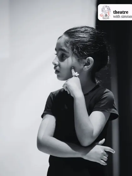 A thoughtful moment during a workshop. We create an environment where quiet observation and deep thinking are just as valued as bold expression.