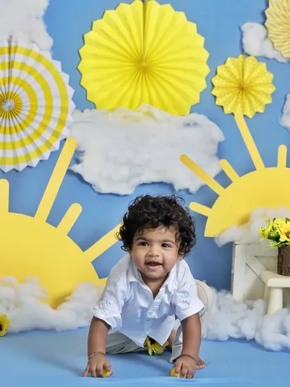 A bright and cheerful "You Are My Sunshine" theme. This crawling shot captures the baby's movement and energy against a sunny, happy backdrop.