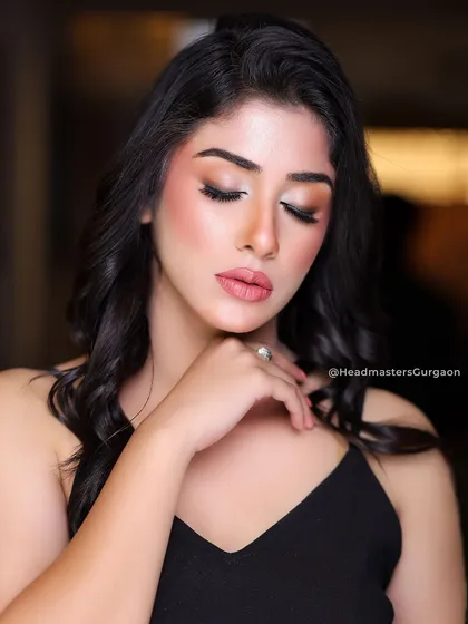 A close-up showing the soft, blended eyeshadow and flawless skin of this makeup look. It's a perfect example of "less is more" elegance.