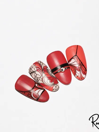 A beautiful stamping design with a floral motif on a red gradient base.