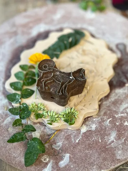 Using nature as a tool and inspiration. At my retreats, we often incorporate natural elements like leaves and woodblocks to texture our clay.