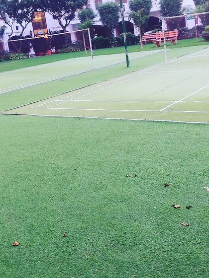 I also install artificial turf for sports applications, like this badminton court. The turf is designed to be durable and provide a consistent playing surface.