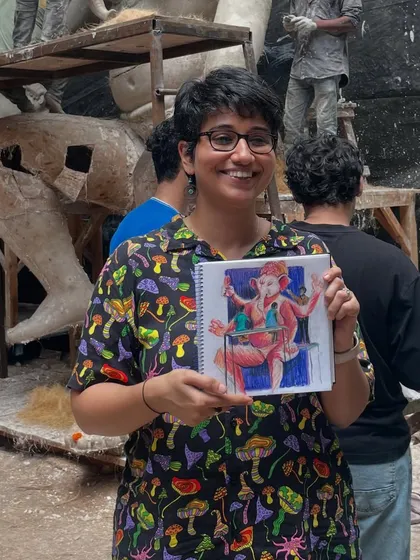 So happy to be sketching at a Ganpati idol workshop! Here I am with my finished coloured pencil drawing, surrounded by the incredible murtis in various stages of creation.