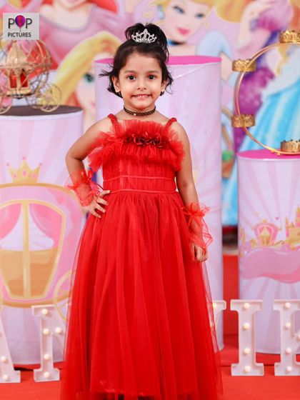 A charming 'Baby Boss' themed birthday party, with a sophisticated black and white color scheme, custom props, and a stylish backdrop, perfect for a little executive.