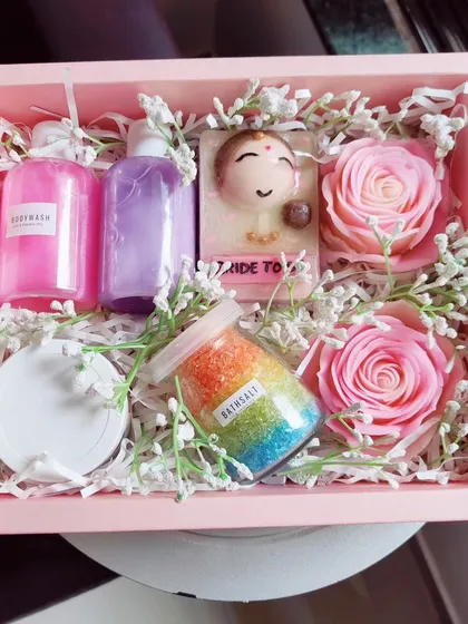 A "Bride to be" gift hamper, filled with luxurious handmade bath products like strawberry bodywash, lavender bodylotion, and custom soaps.