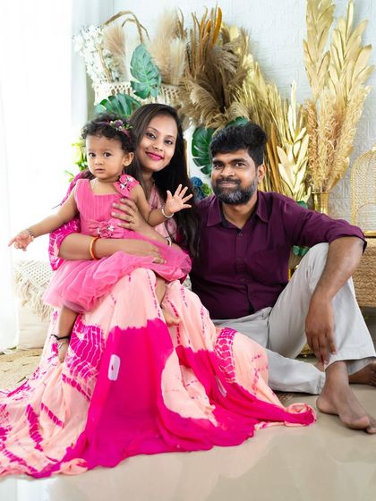 A relaxed and happy family portrait. My goal is to make everyone feel comfortable so I can capture your family's natural dynamic.