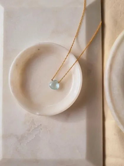 Another view of my aquamarine heart-shaped drop pendant, a calming and soothing charm.