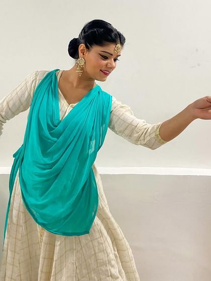 The feeling of completing a performance is one of immense gratitude and fulfillment. This picture was taken after a show, capturing the quiet joy of sharing my art.