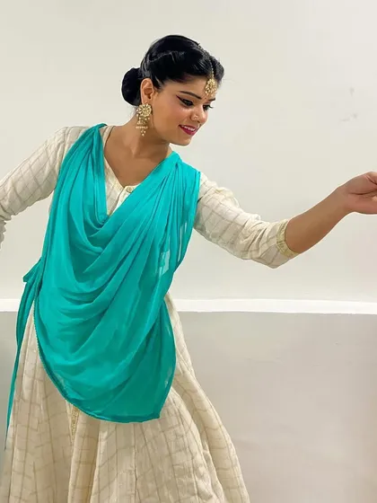 The feeling of completing a performance is one of immense gratitude and fulfillment. This picture was taken after a show, capturing the quiet joy of sharing my art.