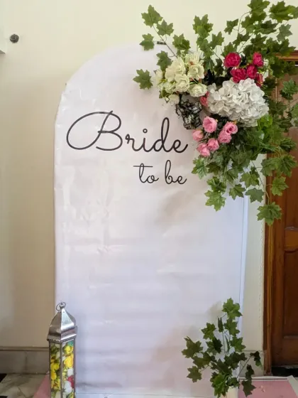 A full view of the minimalist floral 'Bride to be' setup, complete with a decorative lantern. This is great for smaller, more intimate gatherings.