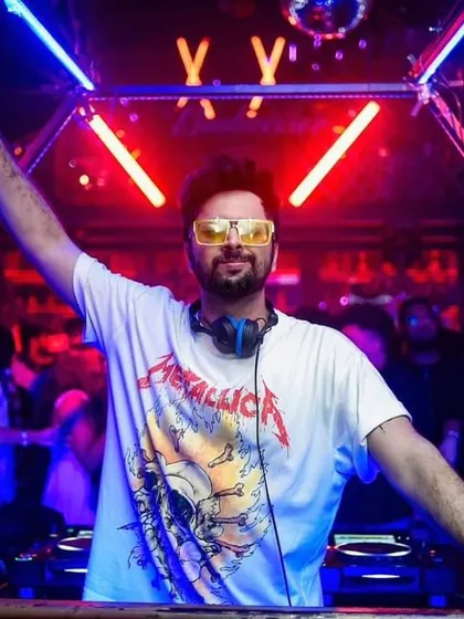 Rocking a Metallica tee for a Bolly Tech night at The Fixx. The power of metal music fuels the energy at my parties.