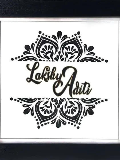 For this custom nameplate, I used a bold, black ink mandala design to create a striking frame for the names "Lakshy Aditi." It’s a modern yet intricate piece that shows how we can blend traditional patterns with personalized art.