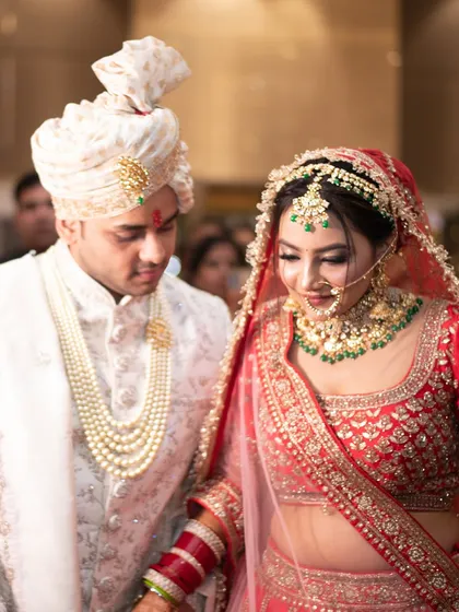The couple taking their first steps together during the wedding ceremony. We capture the solemnity and emotion of the rituals that bind them together.
