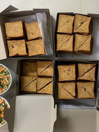A school picnic order with sandwiches and quinoa salad.