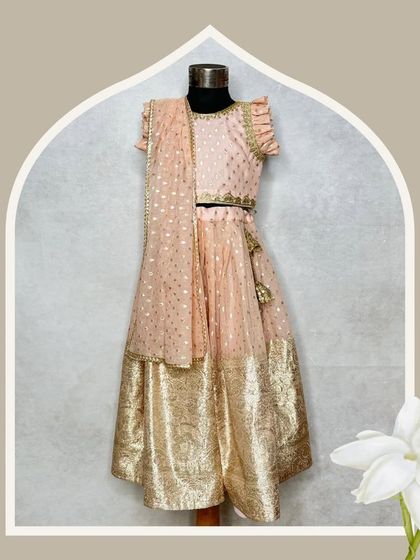 The periwinkle lehenga, beautifully framed, highlighting its soft, elegant appeal.