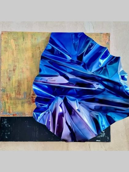 A unique commission where a blue Meteor sculpture is mounted on a painted canvas, blending 3D form with 2D texture.