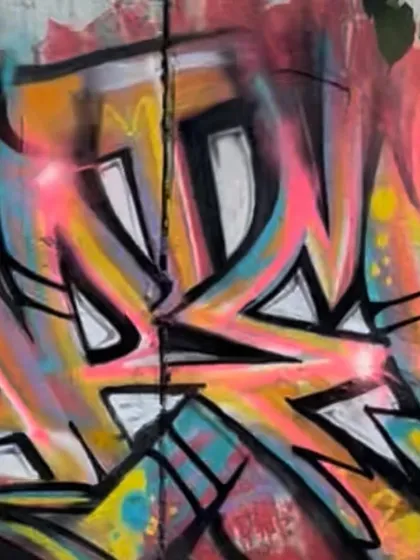 Detail of the pink and yellow wildstyle lettering. Each piece is a puzzle of shapes and colors, designed to have maximum visual impact.