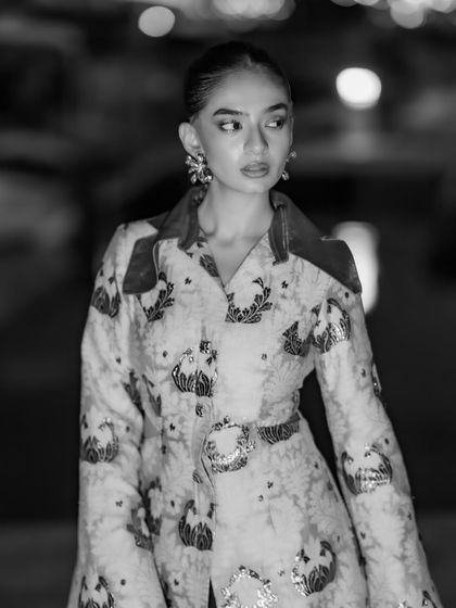 The Nespresso event look in a classic black and white, emphasizing the silhouette and pattern.