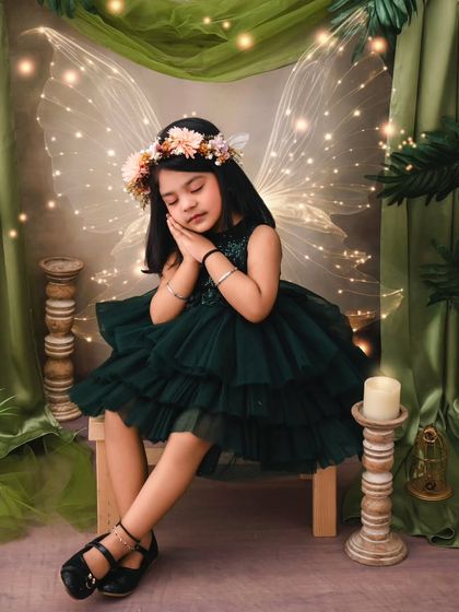 A sleeping fairy in an enchanted wood. This artistic portrait captures a moment of pure peace and magic.