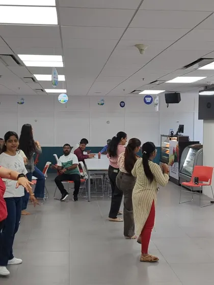 The team at Mercer following along during our Zumba session. I make sure everyone feels involved, creating a sense of unity and shared accomplishment.