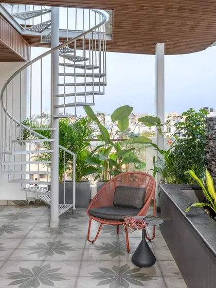 We designed the terrace of the Avani Residence as a tranquil escape, complete with a spiral staircase and lush planters. It's a space crafted for both quiet introspection and lively entertainment, showcasing our ability to blend architecture with nature.