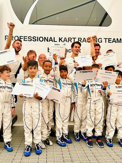 The graduating class of the Baby Race Summer Camp, celebrating their achievements.