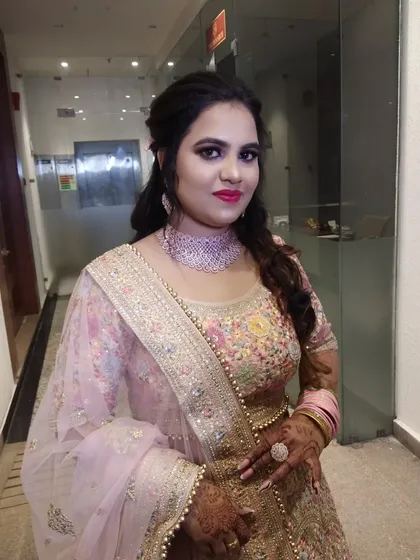 A confident portrait of the client, ready for her event. The makeup is designed to be both beautiful and long-lasting.