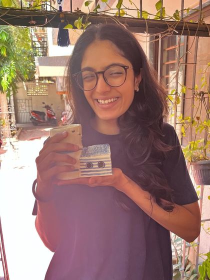 This student took to pottery like a fish to water. In her advanced course, she created this massive, beautiful planter, a real achievement that shows her dedication and skill. I am so proud of her.