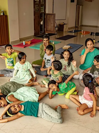 This image captures the pure, unfiltered joy that is at the heart of my classes. It’s not about perfect poses, but about finding happiness and ease in our bodies. This is the kind of shanti, or peace, that we cultivate together.