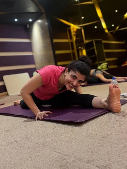 A smile during a deep stretch. The joy and focus in a group class are contagious. Balance is something you create, not find.