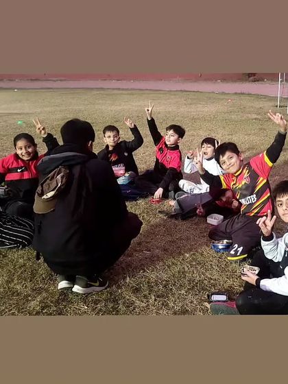 Post-session storytelling with our junior players. Building bonds and sharing stories after a good training session.