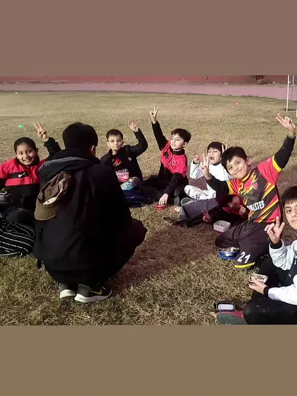Post-session storytelling with our junior players. Building bonds and sharing stories after a good training session.