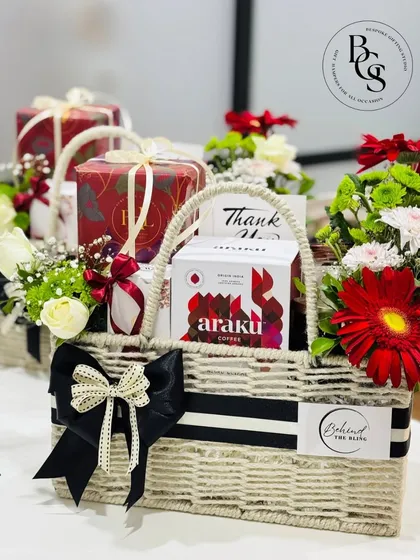 This thank you hamper, featuring Araku coffee and other curated items, is a sophisticated way to express gratitude. The fresh flowers and elegant basket make it a memorable gift for clients or partners.