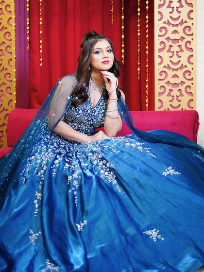 Another beautiful seated pose, perfect for showcasing a princess-like look.