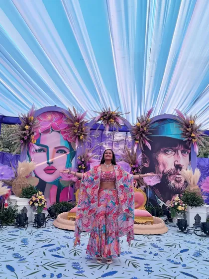 Another shot of my vibrant outfit, this time with a beautiful blue sky peeking through the tent.