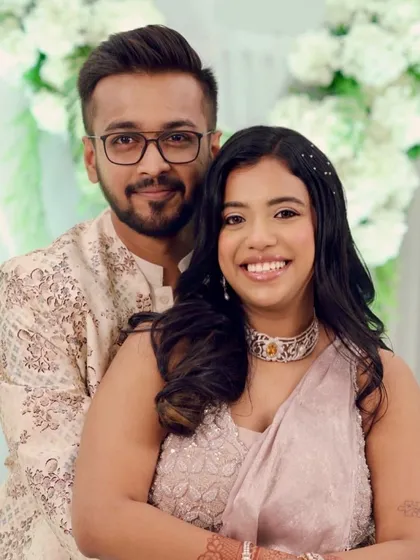 A sweet couple portrait from Jeel's engagement. Her soft makeup and pastel lehenga create a romantic and timeless look.