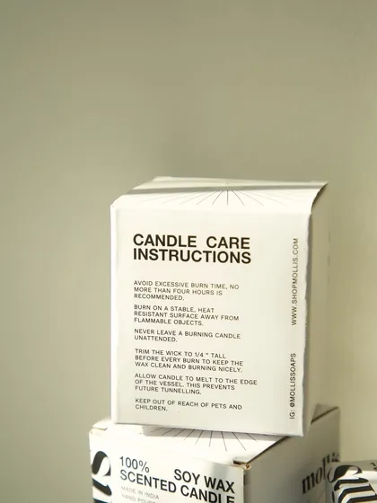 My soy wax candles come in sleek packaging with care instructions printed right on the box to reduce paper waste.