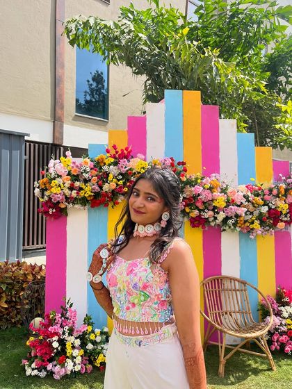 A happy moment captured at my sister's wedding carnival, wearing the outfit I poured my heart into creating. It's a memory I'll always cherish.