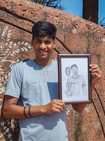 The same happy client holding his framed artwork. It brings me joy to know my art has found a good home.