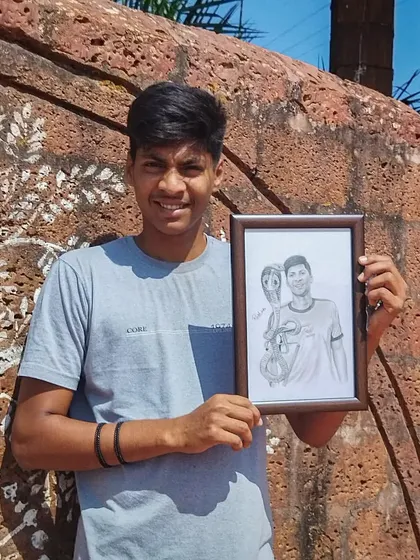 The same happy client holding his framed artwork. It brings me joy to know my art has found a good home.