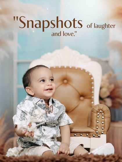 A smiling toddler sits on a miniature throne in a beautiful boho-inspired studio set. His happy expression and the stylish decor combine for a perfect portrait.