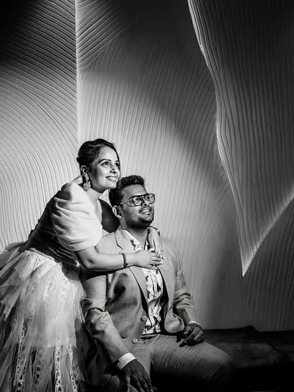 The black and white version of a light-painted portrait. The monochrome treatment emphasizes the texture, lines, and dramatic play of light and shadow in the composition.