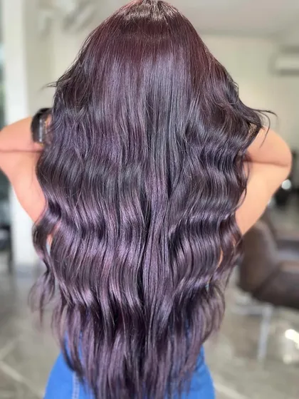 For those who love a pop of color, this dark lavender look is a real head-turner. We use high-quality pigments to create vibrant, lasting shades that express your unique style.