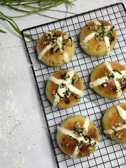 Our freshly baked Korean Buns. These are soft, savory buns filled with cream cheese and topped with a garlic butter glaze, a very popular treat.