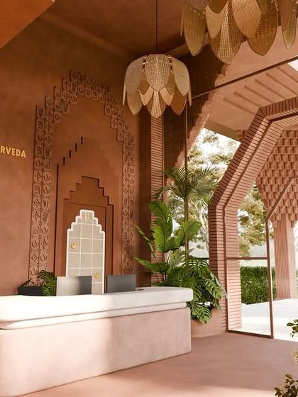 The reception area of the Maharishi Ayurveda Svasta retreat. A jharokha etched with sacred motifs and lotus-petal lights made of woven cane create a serene welcome, rooting the design in Vastu and Ayurveda.