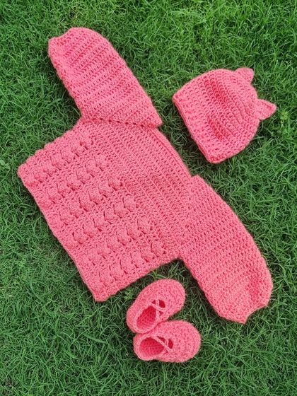 The complete pink bobble set, laid out. This would make such a thoughtful and cherished gift for a new baby.
